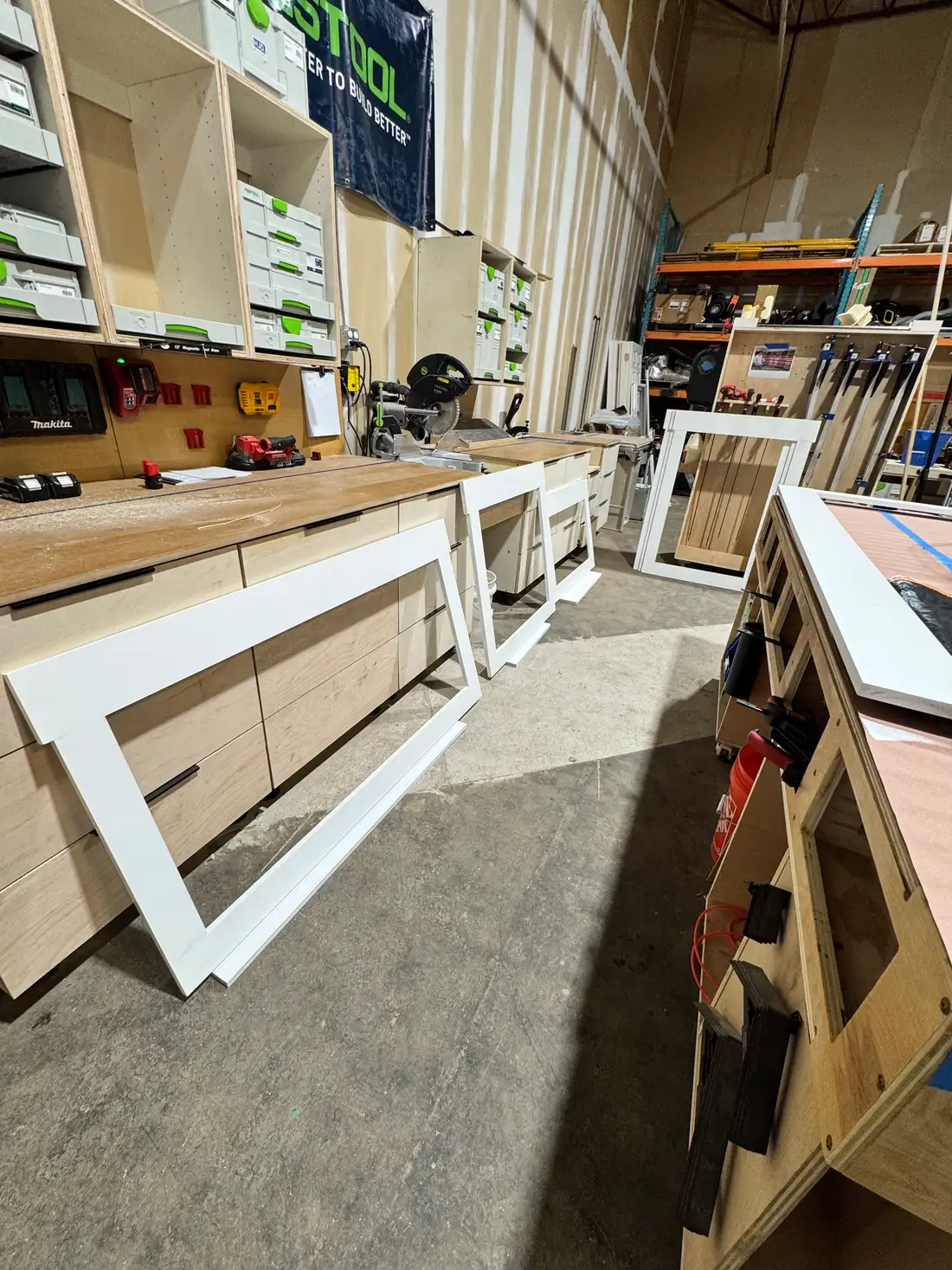 Painted Shaker door fronts staged on the shop bench